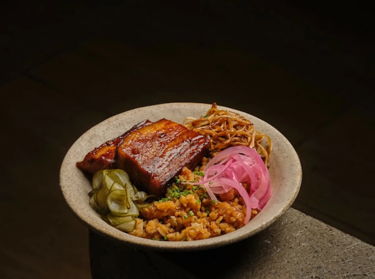 Teriyaki pork belly bean sprouts pickled cucumber
