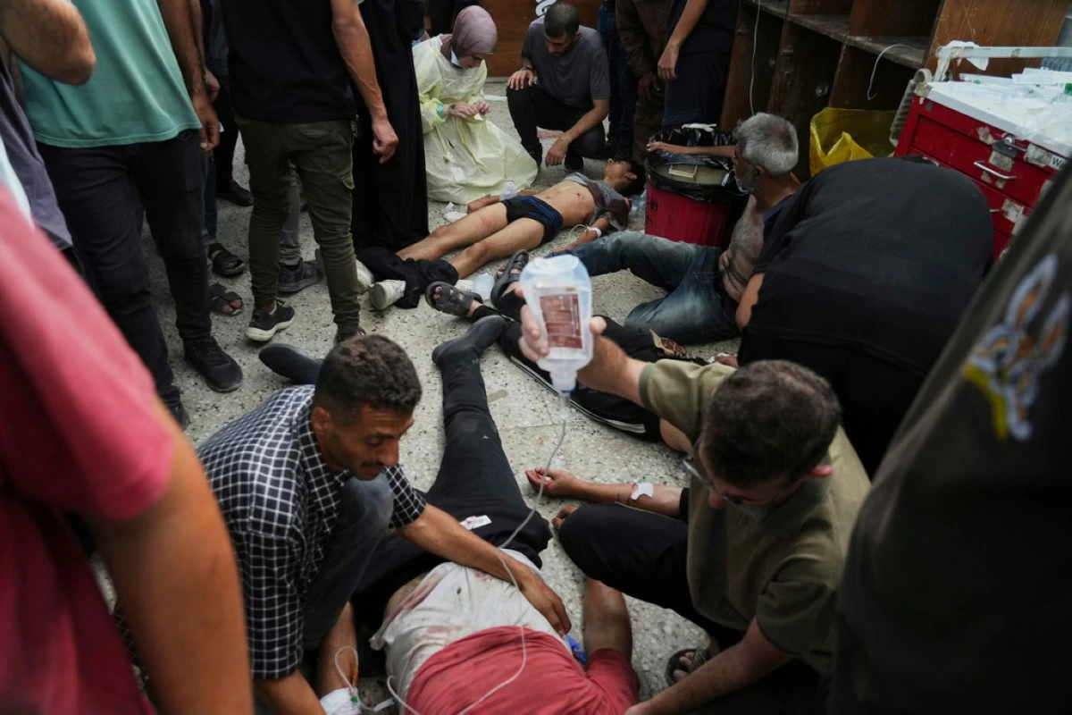 Palestinians wounded during Israeli strikes are treated in the Shifa Hospital, Gaza City, Monday, June 30, 2025. (AP Photo/Jehad Alshrafi)