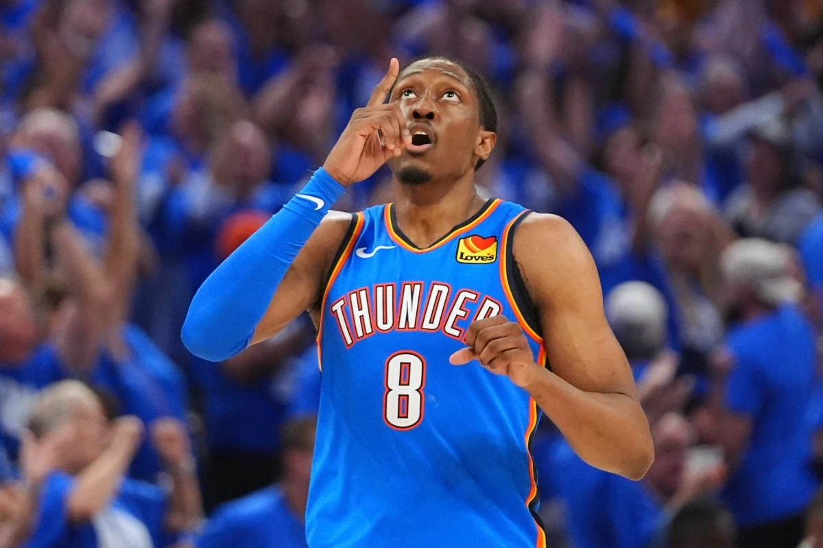 Oklahoma City Thunder forward Jalen Williams (8) reacts after making a 3-pointer during the second half of Game 7 of the NBA Finals basketball series against the Indiana Pacers Sunday, June 22, 2025, in Oklahoma City. (AP Photo/Julio Cortez)