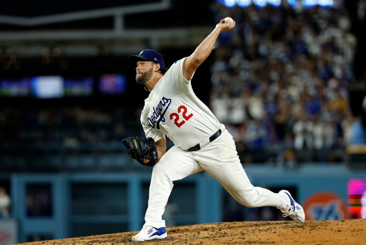Los Angeles Dodgers pitcher Clayton Kershaw throws against Chicago White Sox's Vinny Capra during the sixth inning to strike him out for his 3,000th career strikeout Wednesday, July 2, in Los Angeles. (AP Photo/Kevork Djansezian)