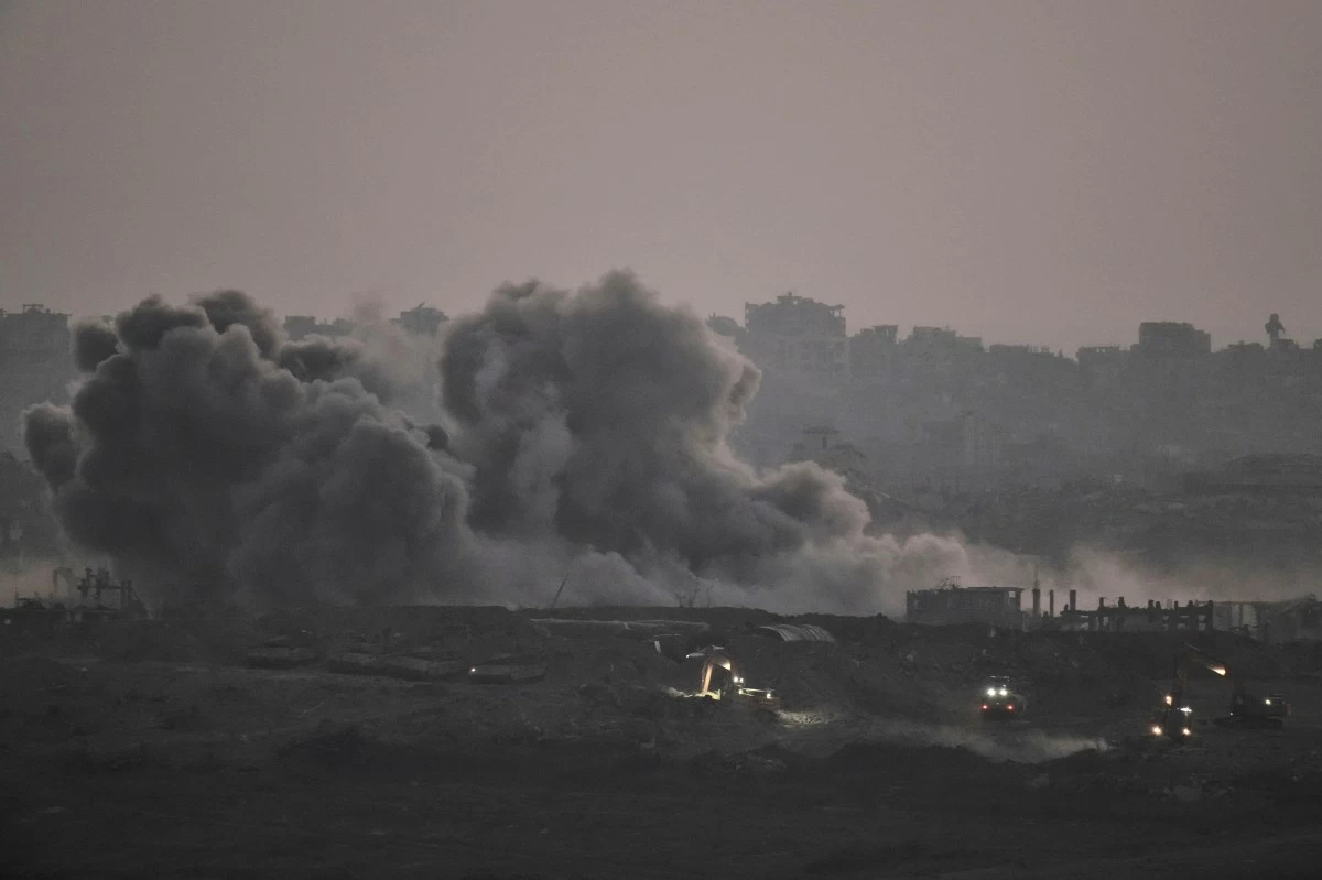 Smoke rises from Israeli bombardment of the Gaza Strip, seen from southern Israel, Thursday, July 3, 2025. (AP Photo/Leo Correa)