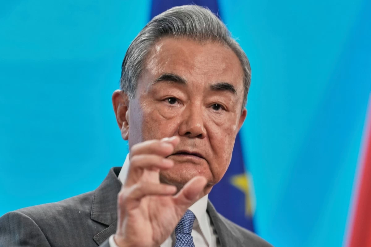 Chinese Foreign Minister Wang Yi briefs the media at the foreign ministry in Berlin, Germany, Thursday, July 3, 2025. (AP Photo/Markus Schreiber)