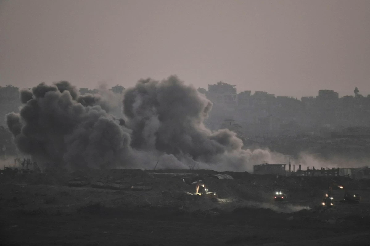 Smoke rises from Israeli bombardment of the Gaza Strip, seen from southern Israel, Thursday, July 3, 2025. (AP Photo/Leo Correa)