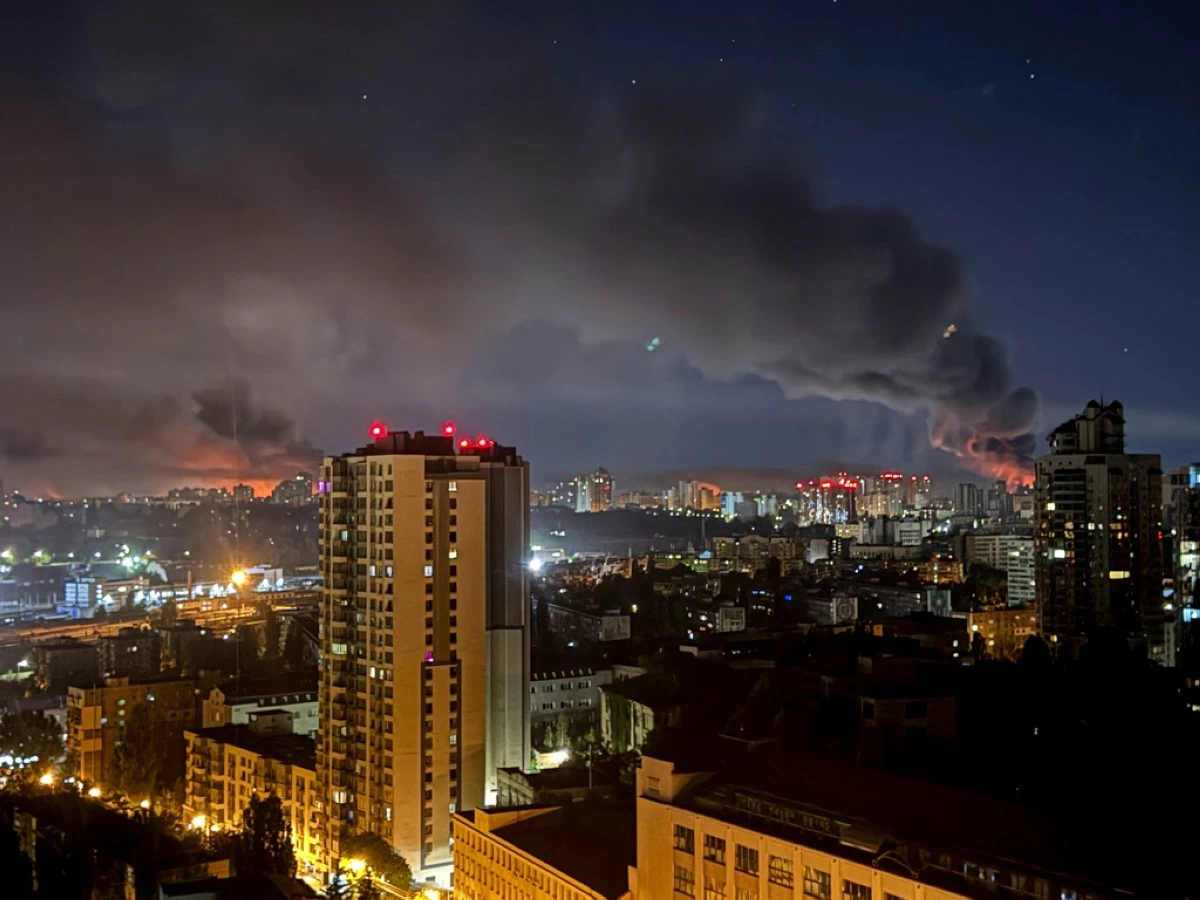 Smoke rises after a Russian strike on Kyiv, Ukraine, Friday, July 4, 2025. (AP Photo/Yehor Konovalov)