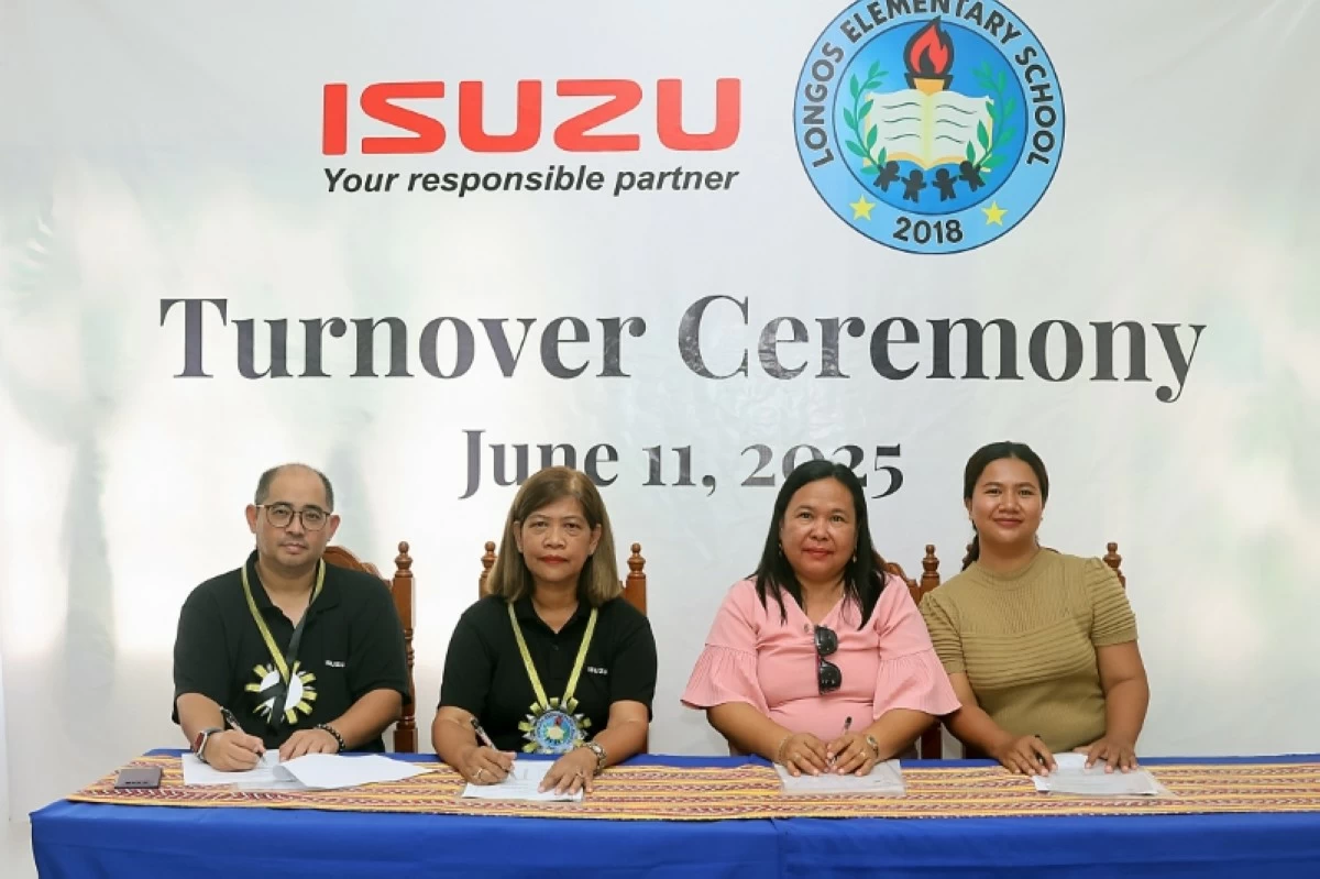 From left: IPC Division Head for Administration, Eric Alcones; IPC Assistant Vice President for Administration, Imelda Bernas; Longos Elementary School Principal II, Zita Balgua; and Nerissa L. Tobias,Teacher III.