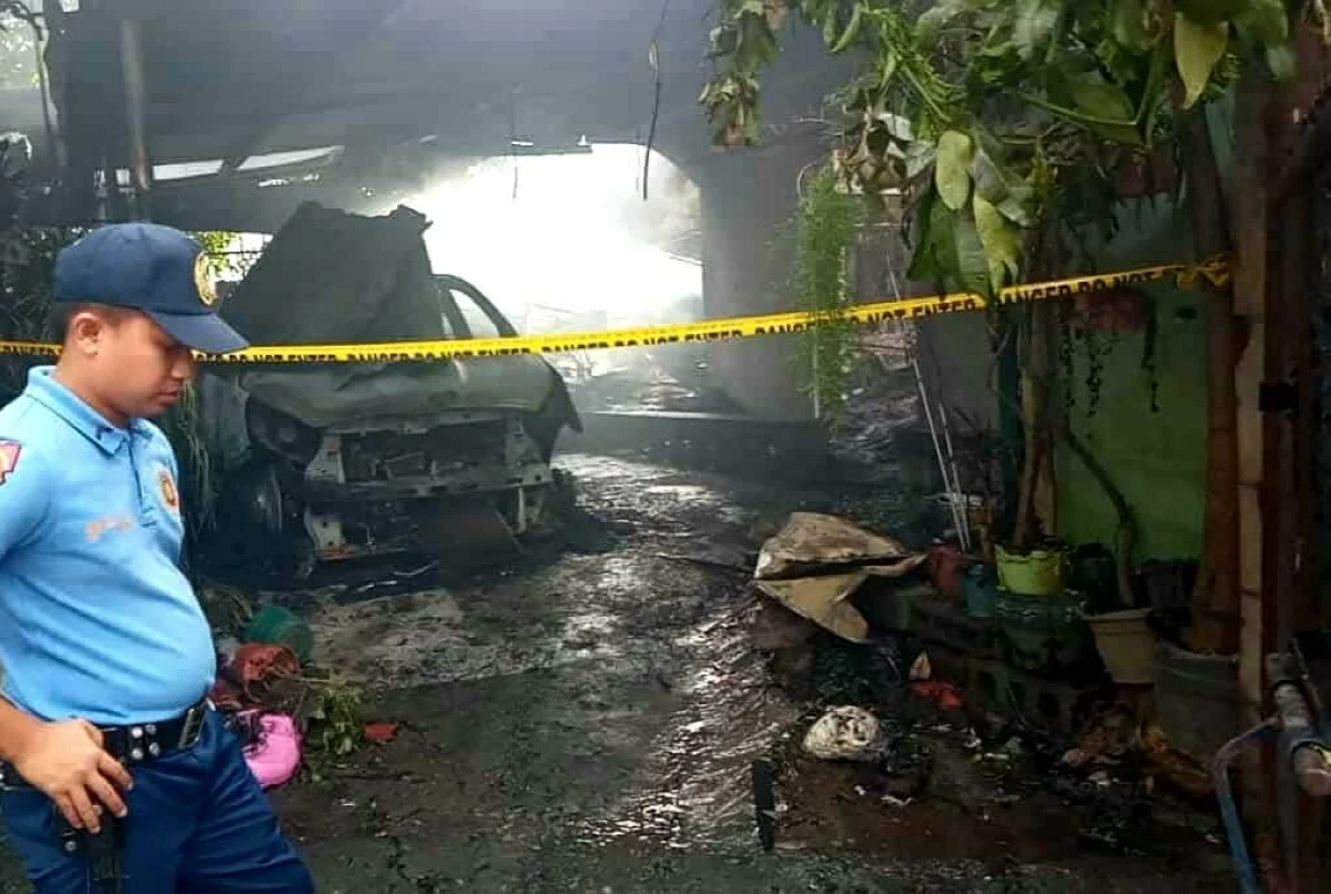 Personnel from a funeral service retrieve the bodies of three fire victims from a house in San Mateo, Rizal, as members of the Scene of the Crime Operatives (SOCO) are also present at the scene. (Photos from Barangay Ampid 1)