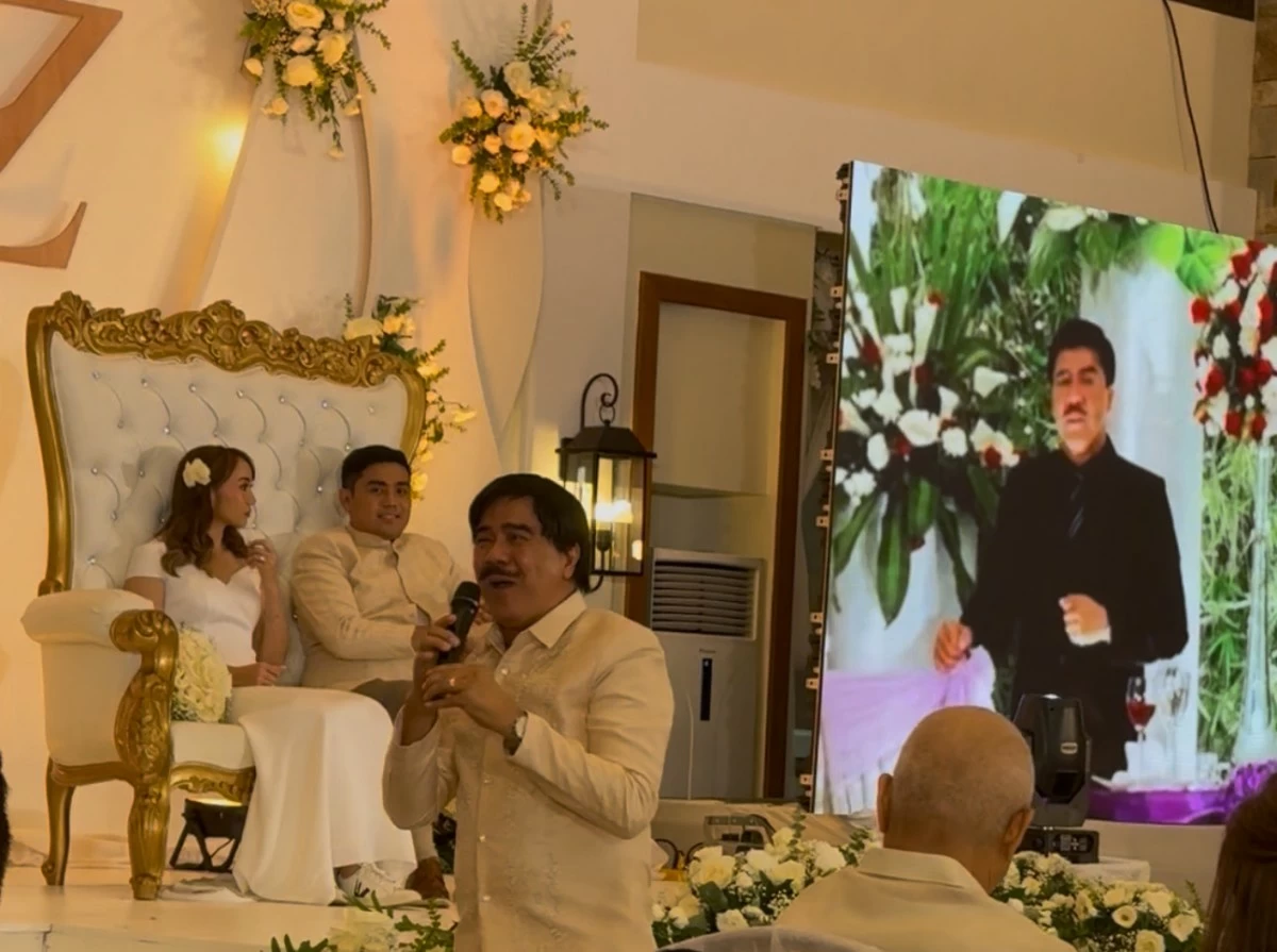 The father of the groom, Steve Tamayo, performing 
