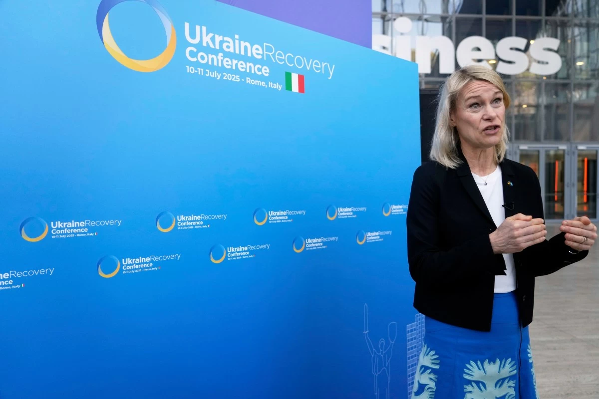 UNHCR Ukraine Representative Karolina Lindholm is interviewed by the Associated Press during the Ukraine Recovery Conference at La Nuvola convention center in Rome, Friday, July 11, 2025. (AP Photo/Gregorio Borgia)