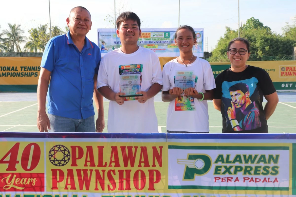 Jan Cadee Dagoon (second from right) and Anthony Cosca display their trophies alongside Mayor Benedict Calderon (left) and PPS Region 2 OIC Karla Gomez (right) following their stellar performances that highlighted Olongapo City’s commanding sweep in the Calderon Cup in Roxas, Isabela.