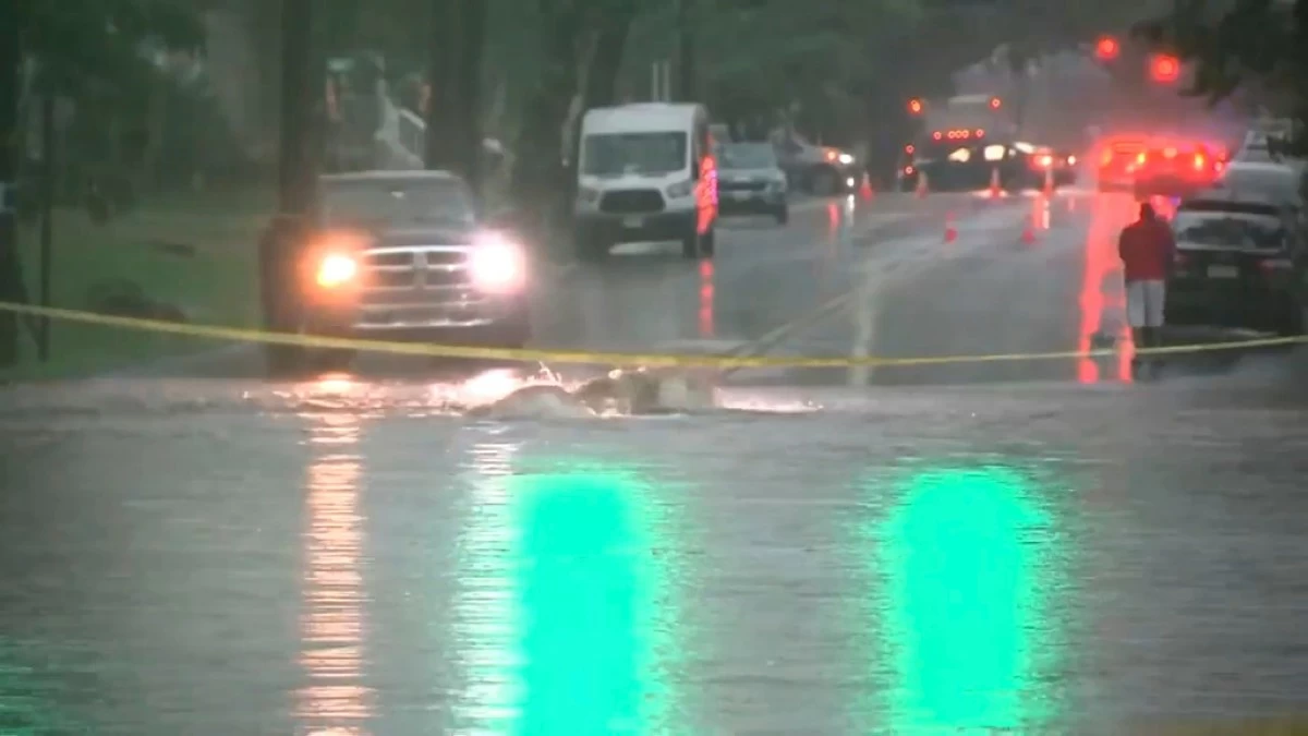 This image made from video shows a flooded street in Rahway, N.J., on July 14, 2025.(WABC-TV via AP)