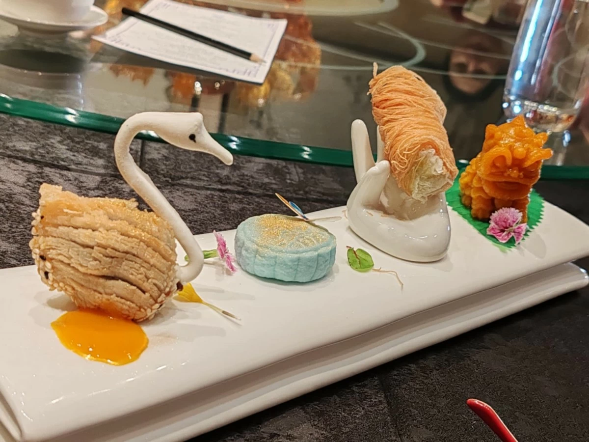 Cranberry Red Wine Snow Skin Kataifi Avocado Lava Golden Swan Puff and Mango Pudding