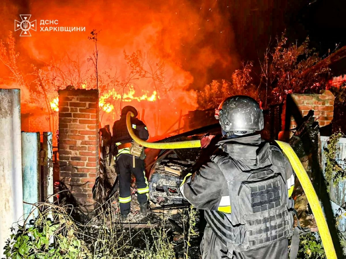 FILE - In this photo provided by the Ukrainian Emergency Service, firefighters try to put out a fire following a Russian attack in the Kharkiv region of Ukraine, Tuesday, July 15, 2025. (Ukrainian Emergency Service via AP, File)