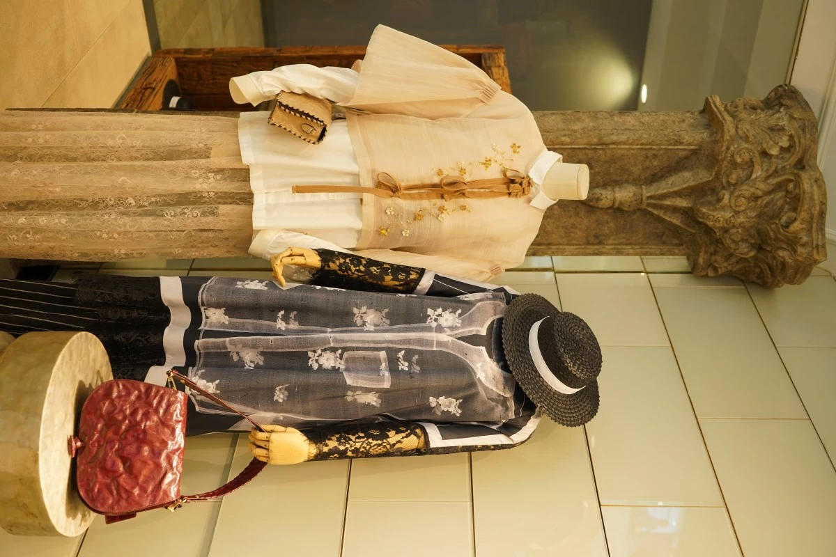 Jo Ann Bitagcol's designs with Equestrian saddle bag in red and Artisan Cassete sling bag in cream