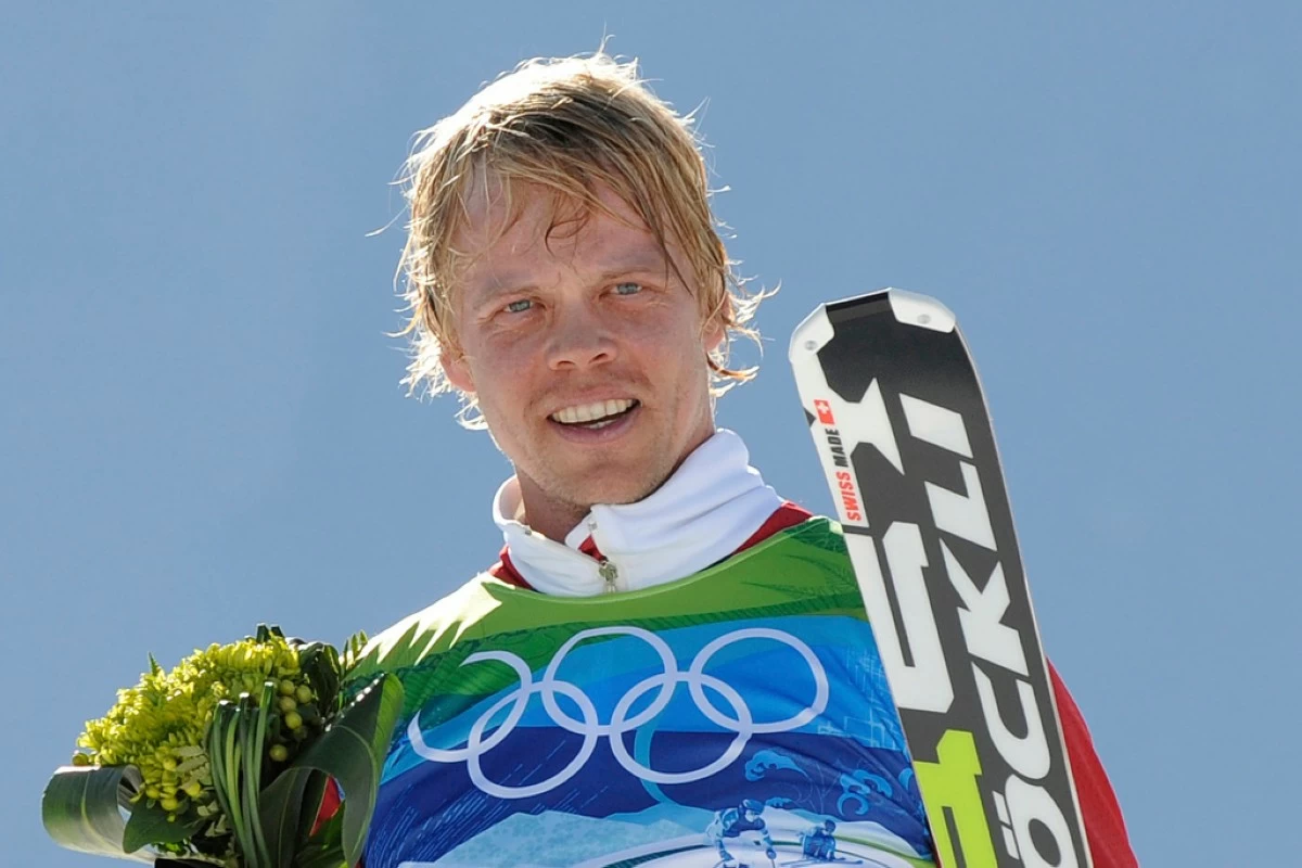 FILE - Audun Groenvold of Norway celebrates after taking third place in the men's skicross competition at the Vancouver 2010 Olympics in Vancouver, British Columbia, Sunday, Feb. 21, 2010. (AP Photo/Mark J. Terrill, File)