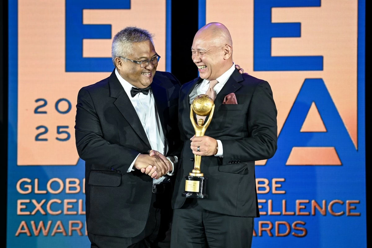 Cruz and Ernest Cu at the Globe Excellence Awards in April 2025.