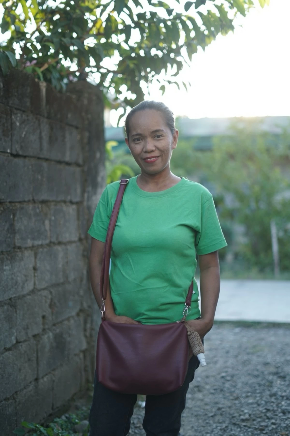 Jennifer, a church caretaker, now lives in her own home with her family in Cabanatuan. 