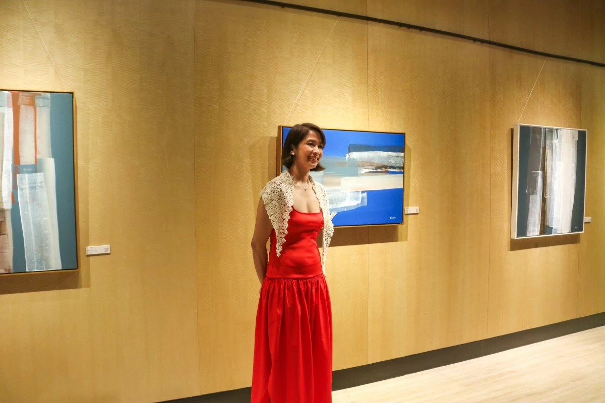 Coeli Manese at Gallery C with her “I Choose You” painting
