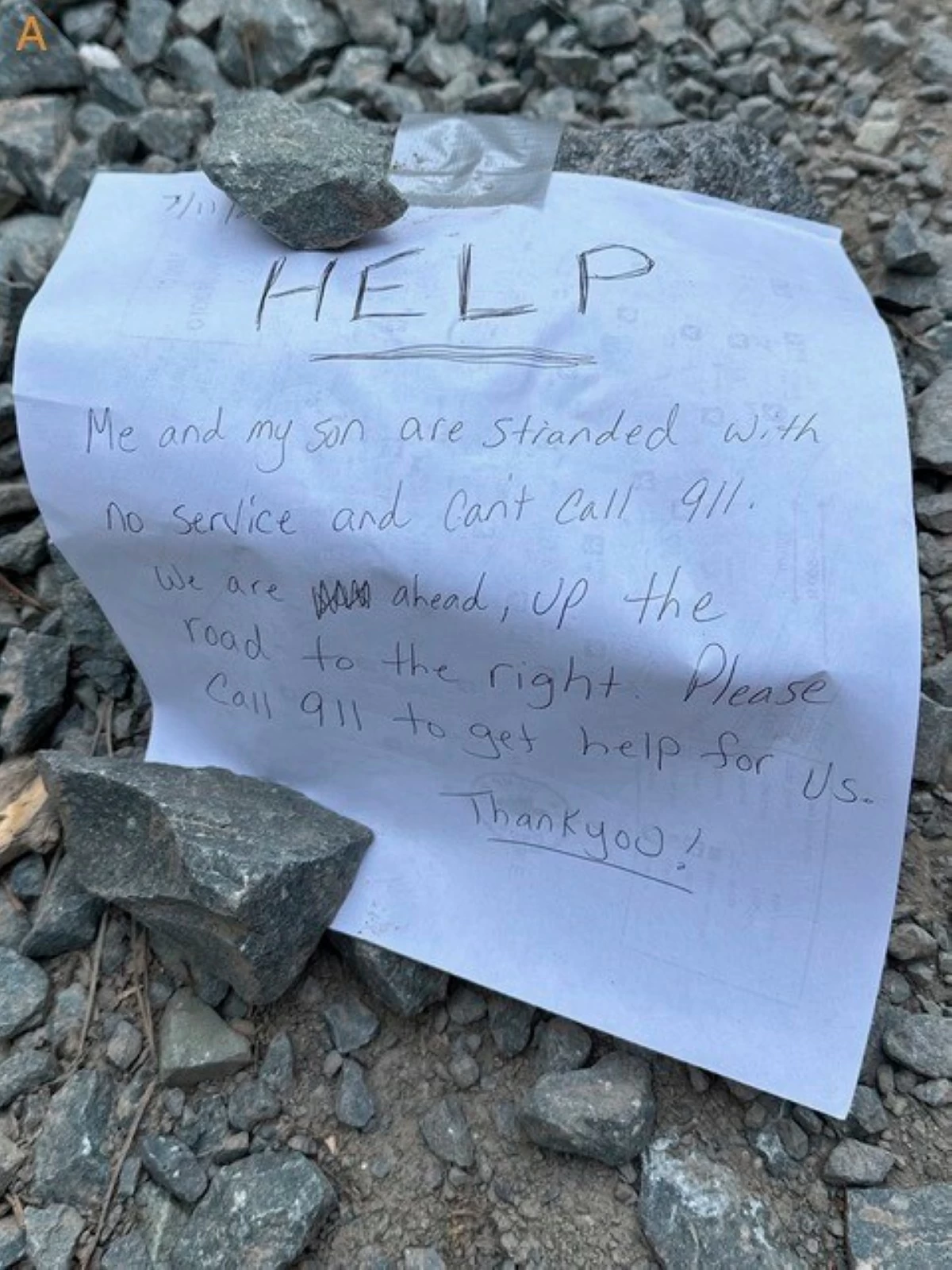 This undated photo provided by the Calaveras County, Calif., Sheriff’s Office shows a note that was left by a woman and her 9-year-old-son, who got lost in a California forest while driving to a Boy Scouts camp, and found by rescuers who then located the pair on Saturday, July 12, 2025. (Calaveras County Sheriff’s Office via AP)
