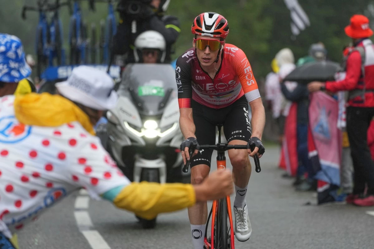 Stage winner Netherlands' Thymen Arensman climbs during the fourteenth stage of the Tour de France cycling race over 182.6 kilometers (113.5 miles) with start in Pau and finish in Luchon Superbagneres, France, Saturday, July 19, 2025. (AP Photo/Thibault Camus)