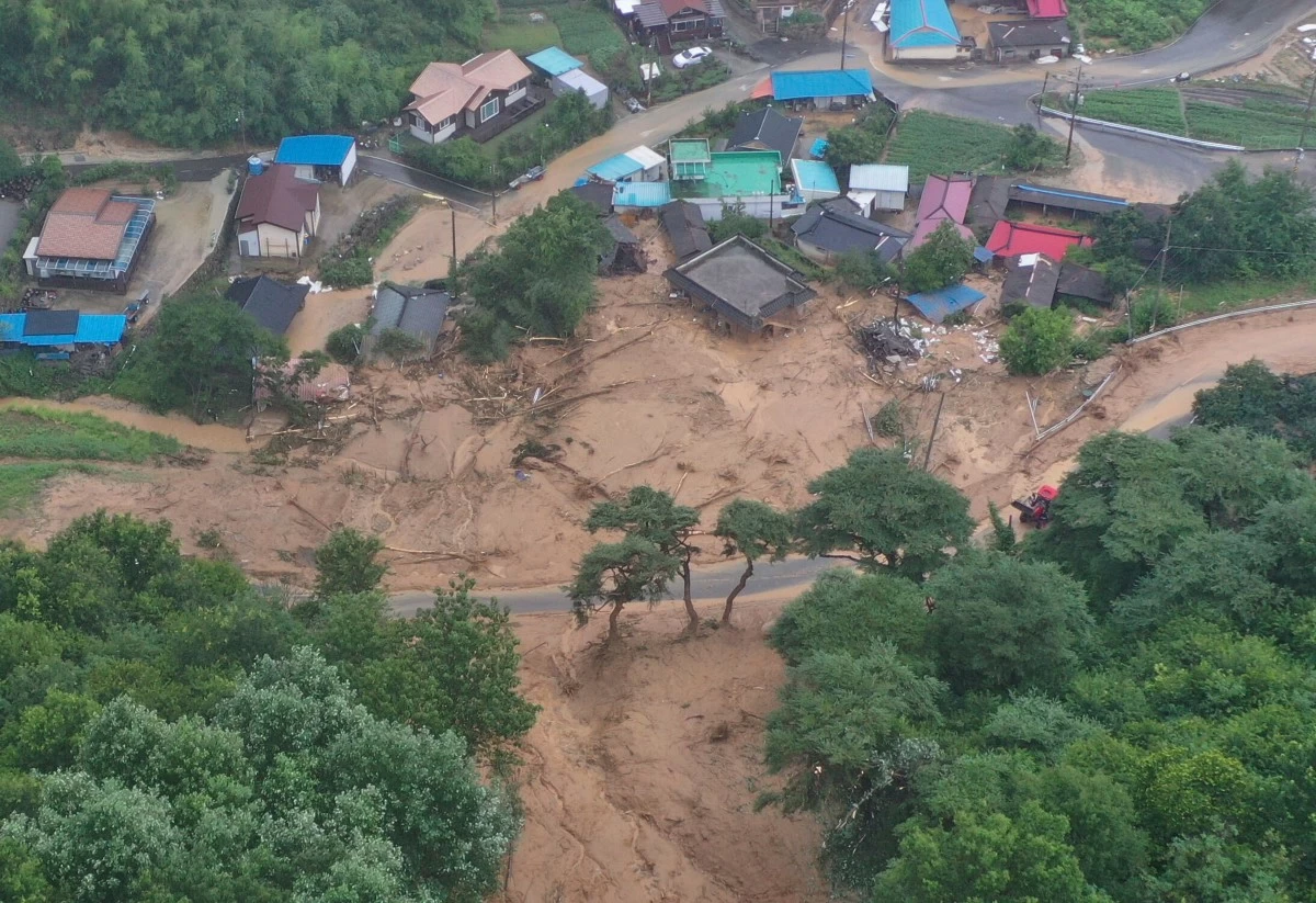 Houses collapsed from a landslide due to heavy rain are seen in Sancheong, South Korea, Saturday, July 19, 2025. (Kim Dong-chun/Yonhap via AP)