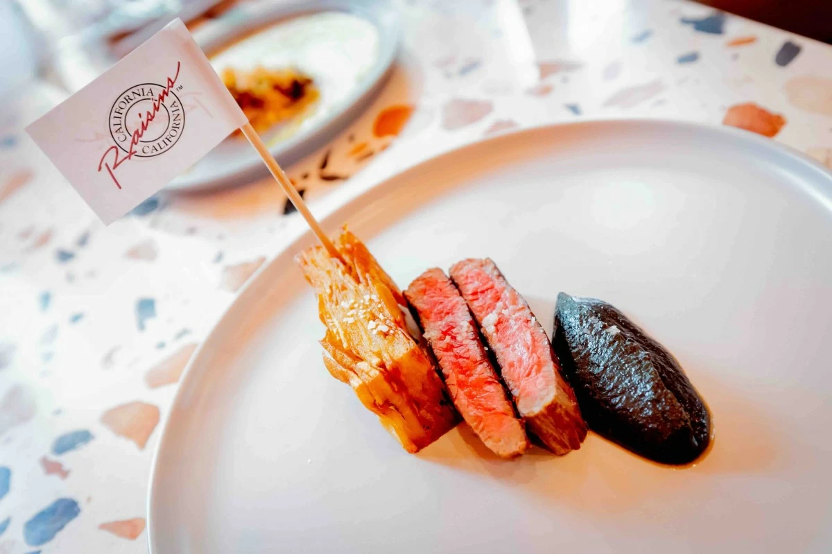 Steak 'Frites' and Potato Pave with California Raisins
