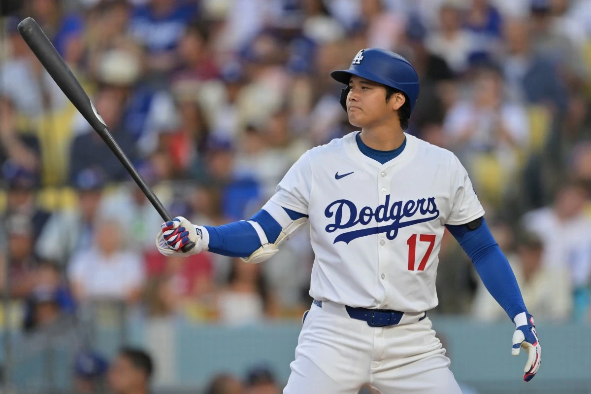 Los Angeles Dodgers' Shohei Ohtani bats against the Minnesota Twins during the first inning of a baseball game in Los Angeles, Monday, July 21, 2025. (AP Photo/Jayne Kamin-Oncea)