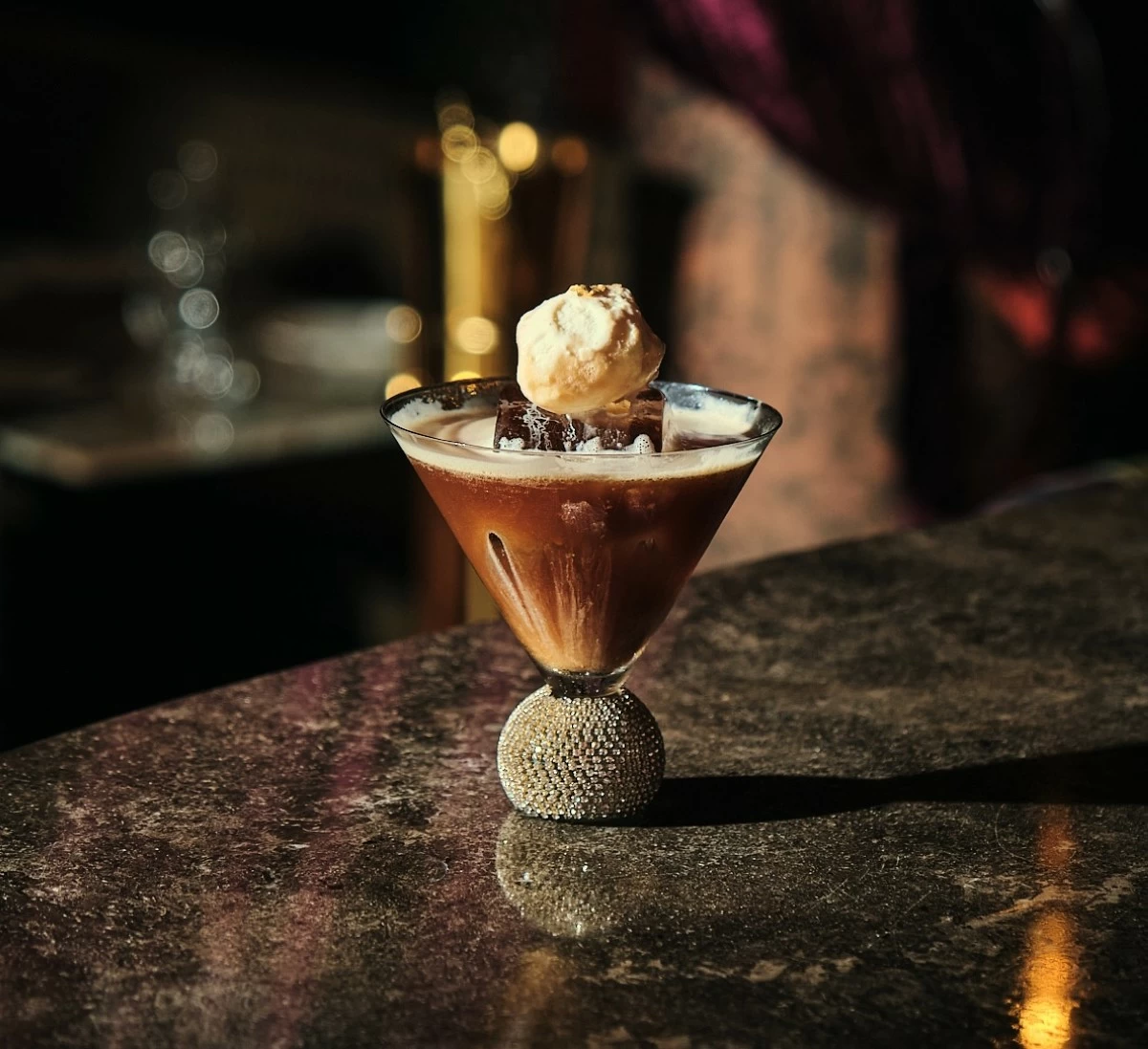 MIDNIGHT STIR The Ambrosia Noir sets the tone with citrus, depth, and a hint of smoke.