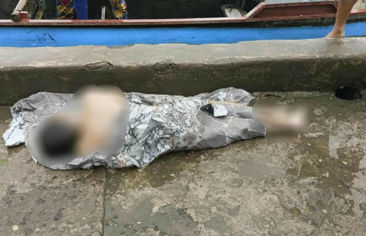 Rescuers recover the bodies of two boys swept away by strong river currents in Morong, Rizal. (Photos from Barangay San Isidro)