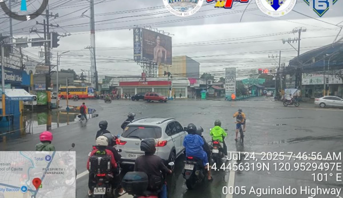 Flood situation along Aguinaldo Highway morning on July 24 (Photo from the Bacoor Disaster Risk Reduction & Management Office's Facebook page/MANILA BULLETIN)