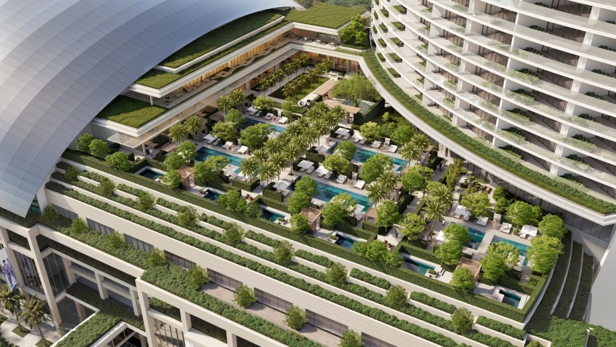 Linked by an elevated walkway, the podium will house 200,000 square feet of conference space, a public lobby, gardens, and a mix of retail and dining venues. (Photo from Sands/Website)