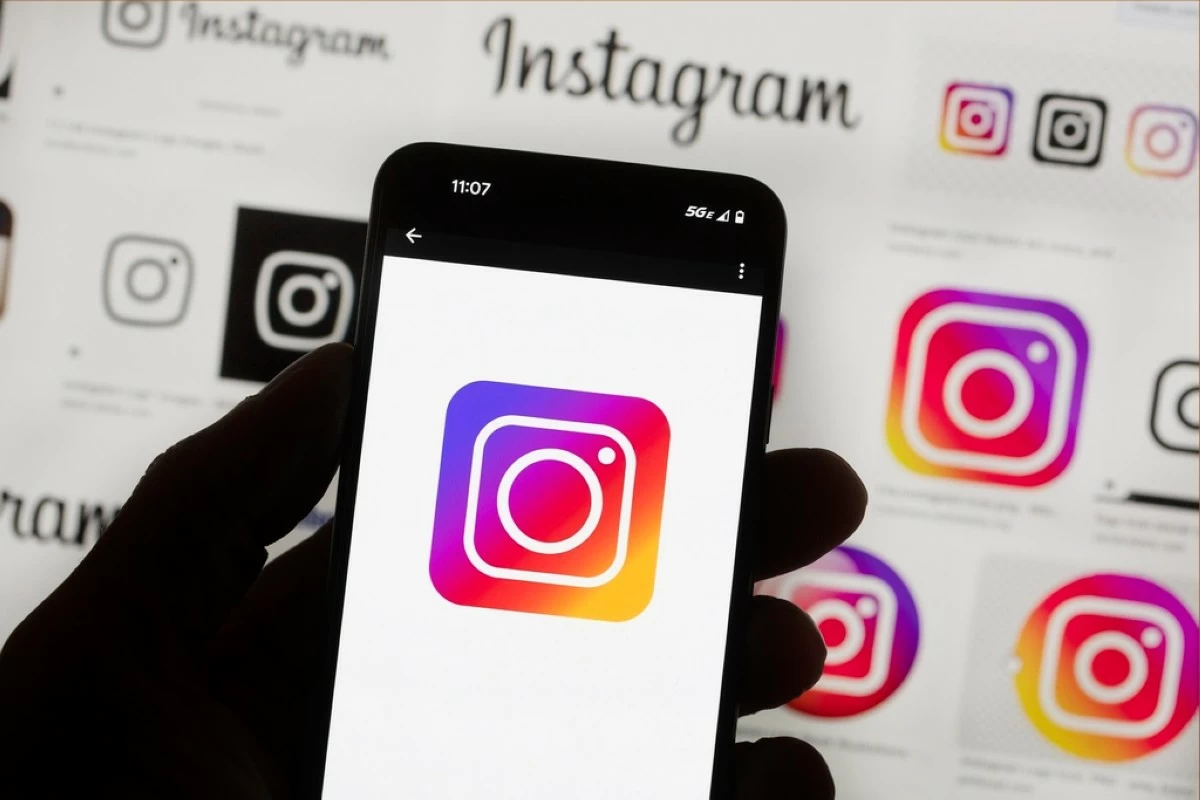 FILE - The Instagram logo is seen on a cell phone in Boston, Oct. 14, 2022. (AP Photo/Michael Dwyer, File)
