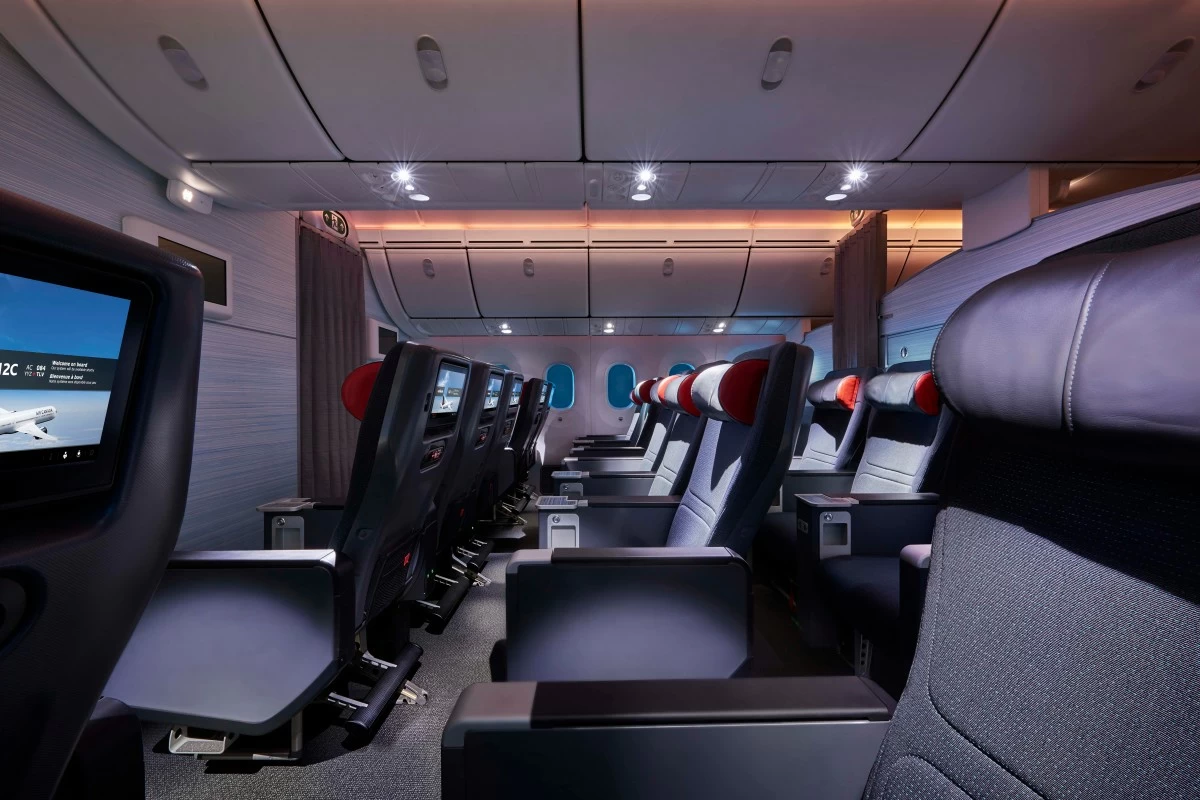 LEISURE IN THE AIR Interior view of the Premium Economy seating at night