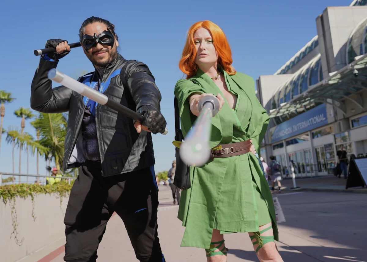 Ivan Martinez, left, dressed as 'Nightwing' and Jade Stone, dressed as 'Poison Ivy Jedi,' pose for a photo before the 2025 Comic-Con International Preview Night in San Diego, California, on July 23. (Images courtesy of AP)