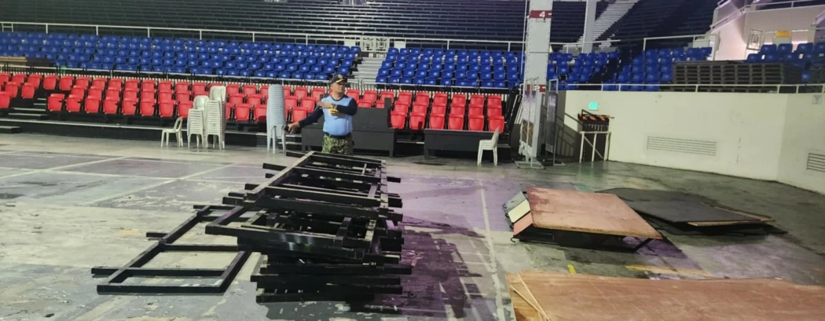 GETTING READY -- A Philippine National Police (PNP) officer supervises the assembly of a boxing ring at the Rizal Memorial Coliseum on Friday, July 25, ahead of what was supposed to be a charity boxing match between PNP Chief Gen. Nicolas Torre III and Davao City Acting Mayor Sebastian 'Baste' Duterte on Sunday, July 27. (Photo courtesy of PNP-PIO)