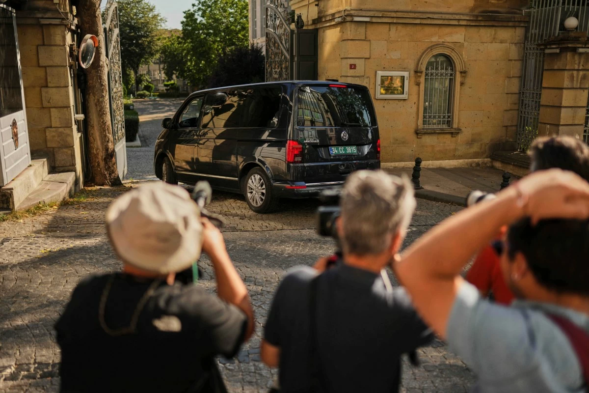 A van, which is believed to carry European diplomats, enters the Iranian consulate ahead of a meeting with Iranian counterparts for talks over Tehran's nuclear program, in Istanbul, Turkey, Friday, July 25, 2025. (AP Photo/Francisco Seco)