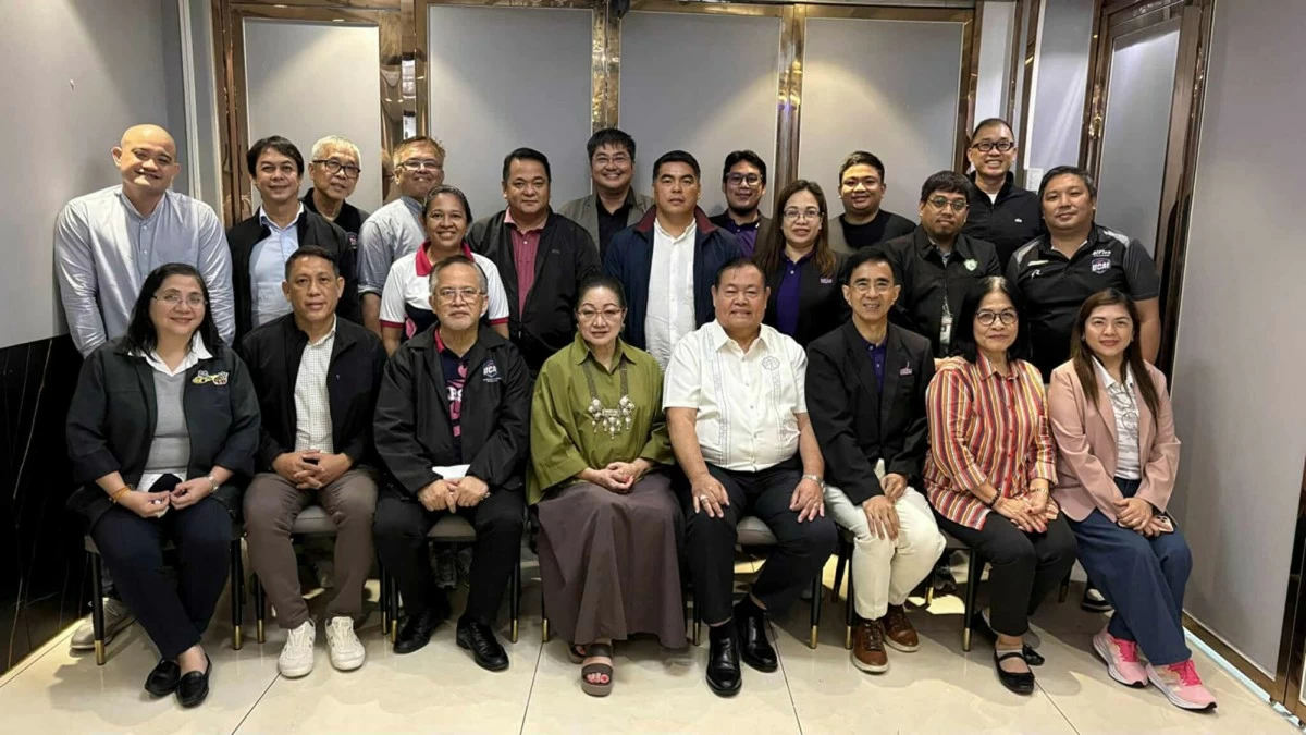 Led by former Senator and Diliman College President Anna Dominique Coseteng (sitting 4th from left), officials and school representatives pose during the turnover of hosting rights to Centro Escolar University. (UCAL)