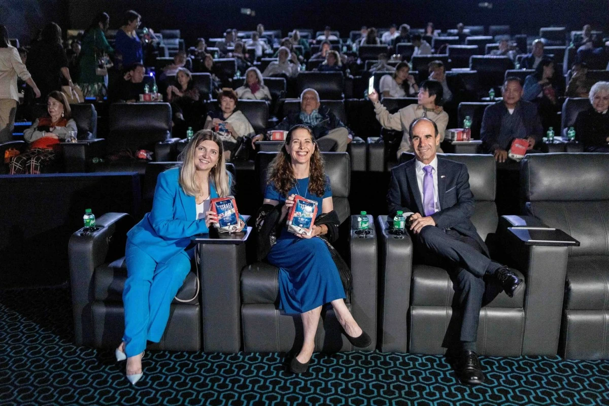 Deputy Ambassador Ester Buzgan, Mme. Gila Fluss (wife of Ambassador IlanFluss), and Ambassador Ilan Fluss of the Embassy of Israel