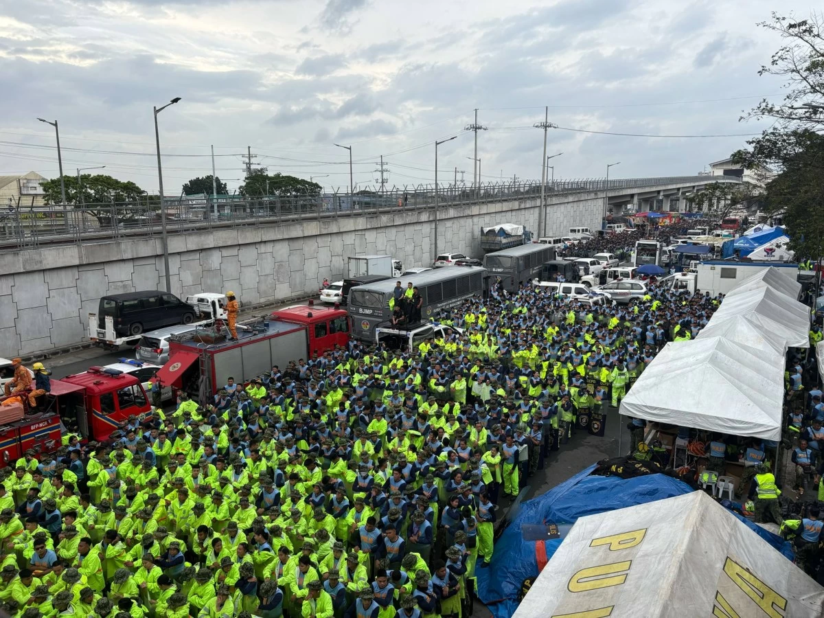 Police officers stationed near St. Peter Shrine along Commonwealth Avenue Quezon City, secures the area for the State of the Nation Address (SONA) of President Ferdinand “Bongbong” Marcos Jr on Monday, July 28.