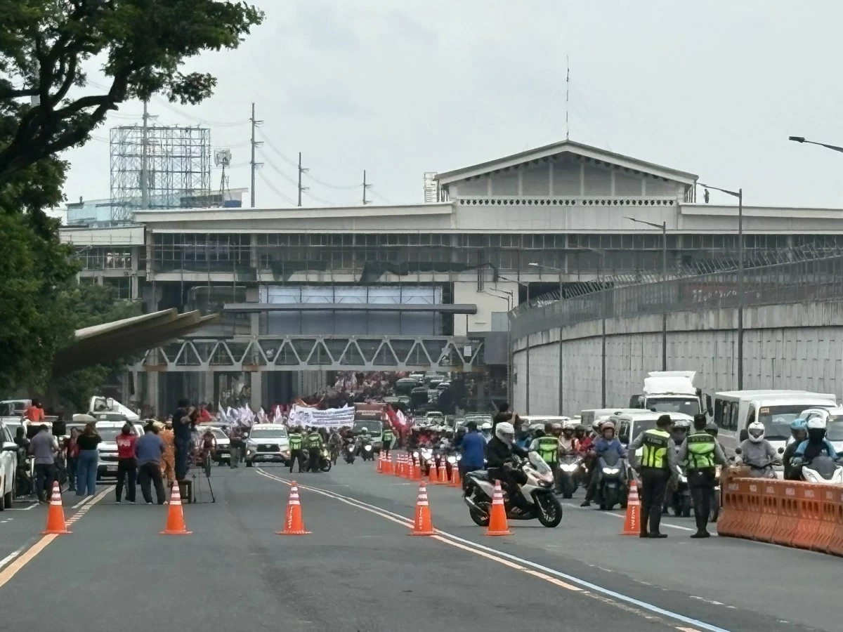 Progressive groups march towards St. Peter Shrine along Commonwealth, Avenue in Quezon City on Monday, July 28, less than an hour before the State of the Nation of Address (SONA) of President Ferdinand “Bongbong” Marcos.