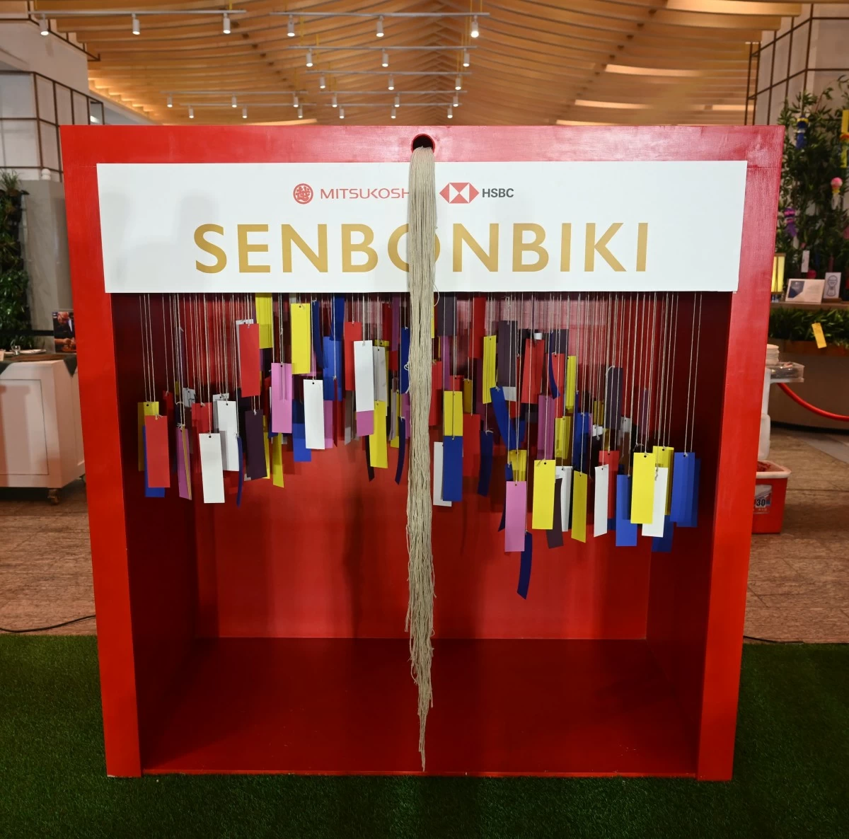 Senbonbiki, a popular matsuri game where each string leads to a surprise, will be available until August 17, every Friday to Sunday, allowing shoppers to try their luck and win exciting prizes.
