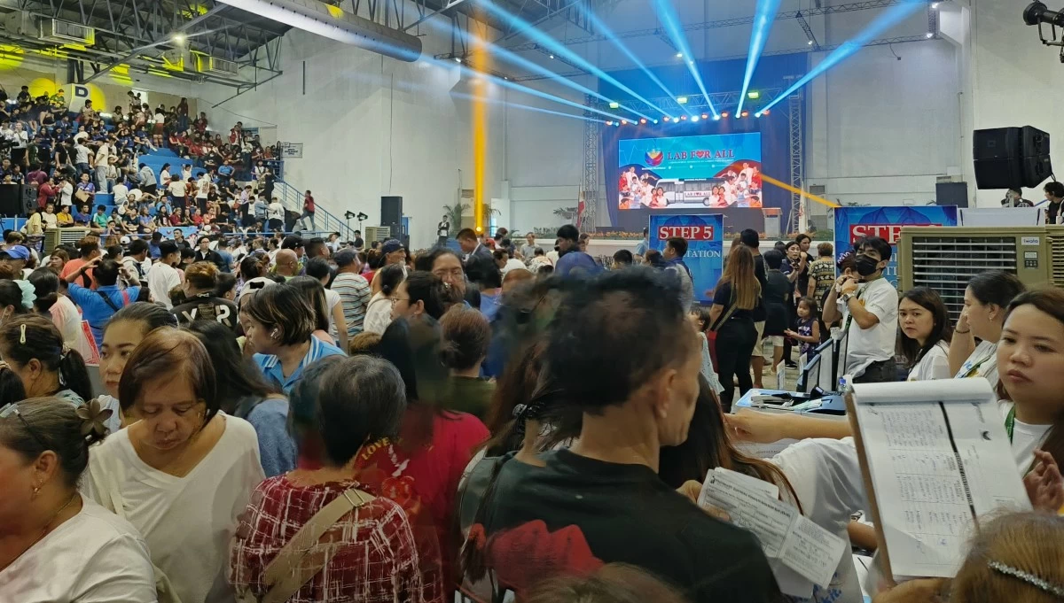 Malabon City residents on Tuesday, July 29, provided with free laboratory services, medicines, and other government assistance through the national government’s “Lab for All: Laboratoryo, Konsulta at Gamot Para sa Lahat '' program, aimed at ensuring that quality healthcare services are accessible to all Filipinos. (Photo by Hannah Nicol)