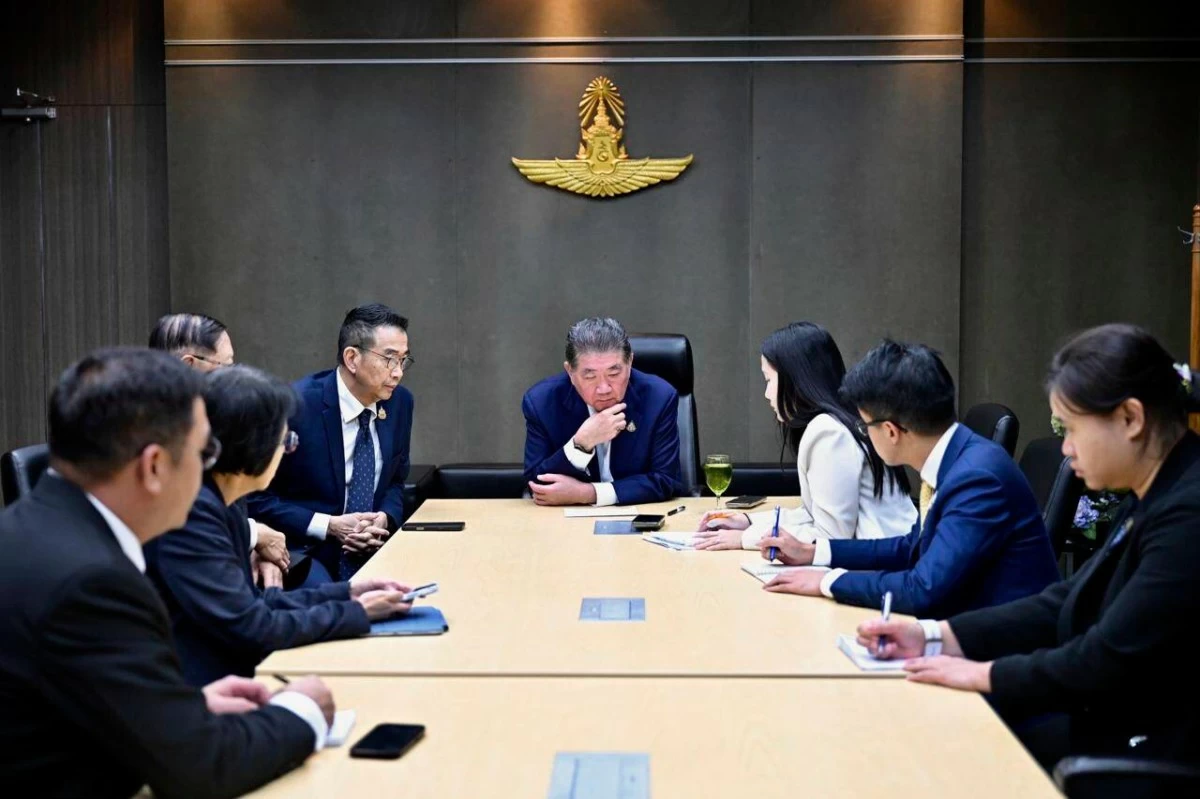 This image provided by the Thai Prime MInister's Office shows Thailand's Acting Prime Minister Phumtham Wechayachai, center, with his staff listening during his phone call with U.S. President Donald Trump, in Bangkok on Monday July 28, 2025, after returning from Malaysia, where he met Cambodian Prime Minister Hun Manet for peace talks which resulted in a ceasefire in the two nations' five days of fighting along their border over a territorial dispute. (Thai Prime MInister's Office via AP)