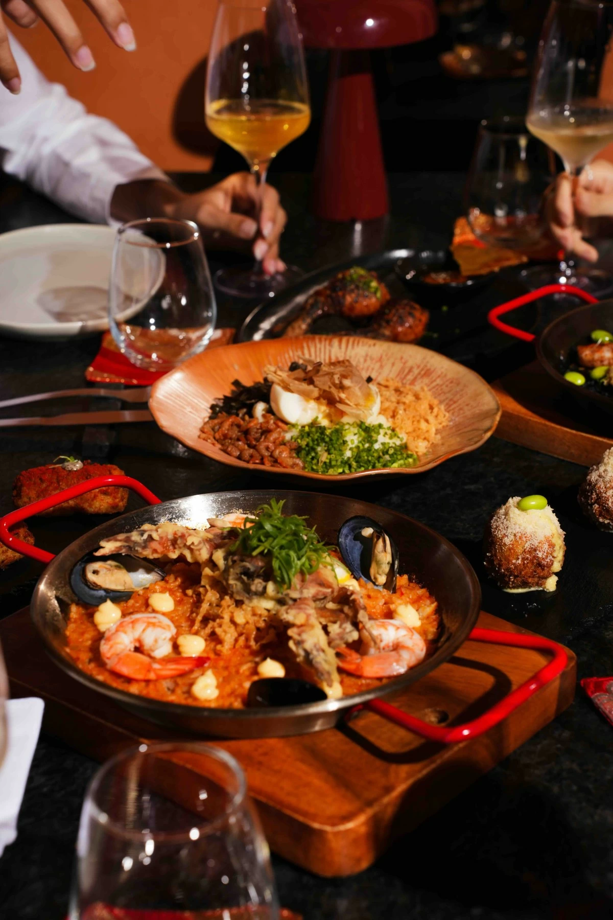 OCEAN FLAIR Matador’s Marisco Paella brings bold ocean flavors to the table, reimagining the Spanish classic with a fresh, modern edge.