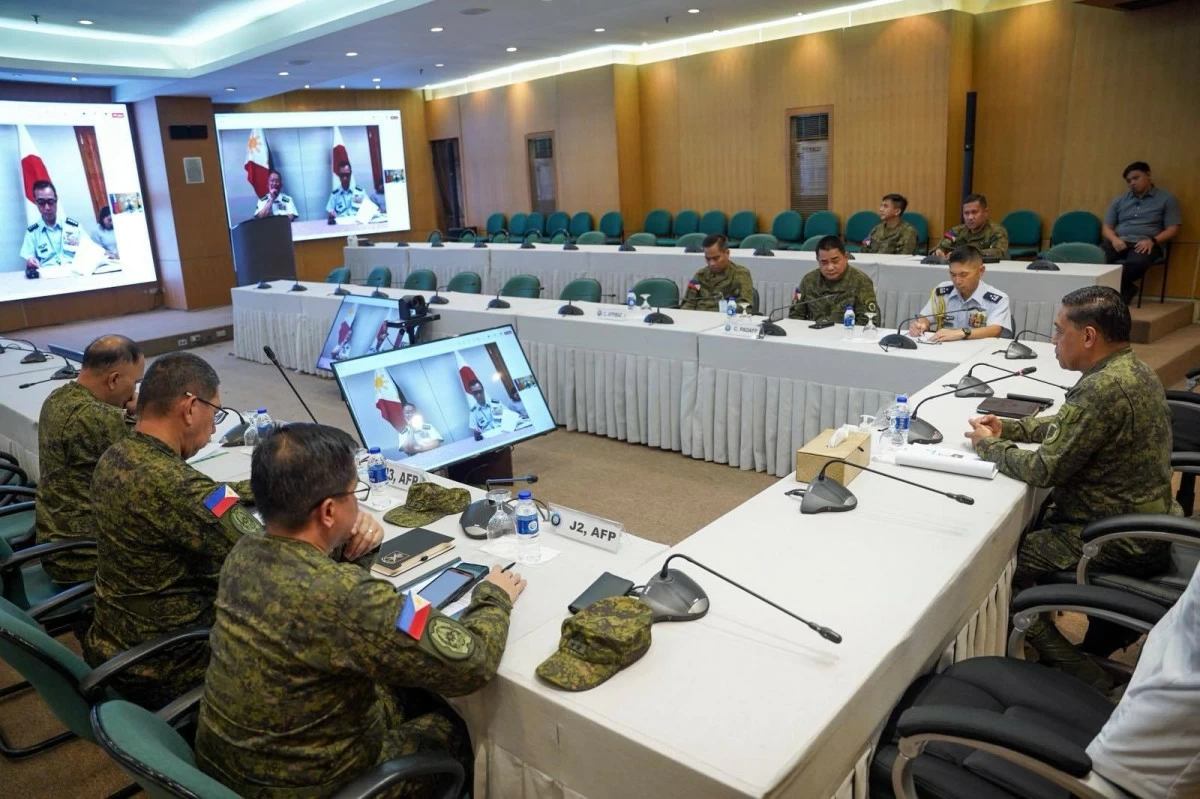 Armed Forces of the Philippines (AFP) Chief, General Romeo Brawner Jr. (rightmost) speaks to General Yoshihide Yoshida and General Hiroaki Uchikura, outgoing and incoming Chiefs of Staff of the Japan Self-Defense Forces (JSDF), in a virtual meeting attended by top officials of the AFP at Camp Aguinaldo in Quezon City on July 29, 2025. (Photo: AFP)