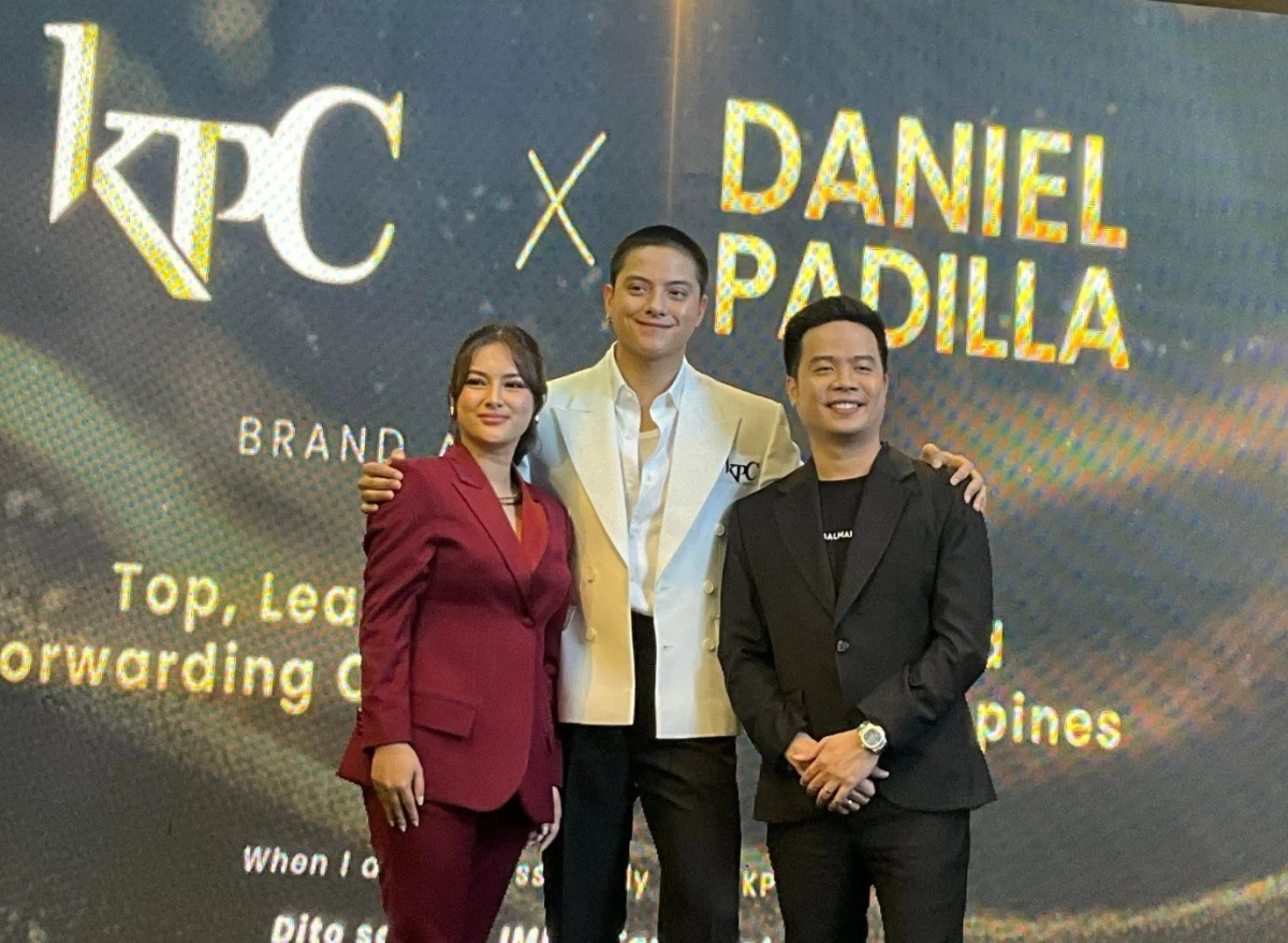 Actor Daniel Padilla (center) with Khelvin P. Cruz (right), Chief Executive Officer of KPC Express Corporation, and his wife, Mary Cruz, co-founder.