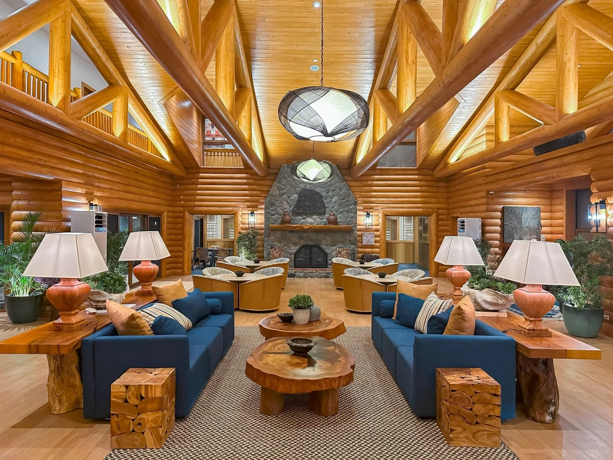 Warm up with a hot cup of coffee by the fireplace at the Balesin Pines lobby lounge.