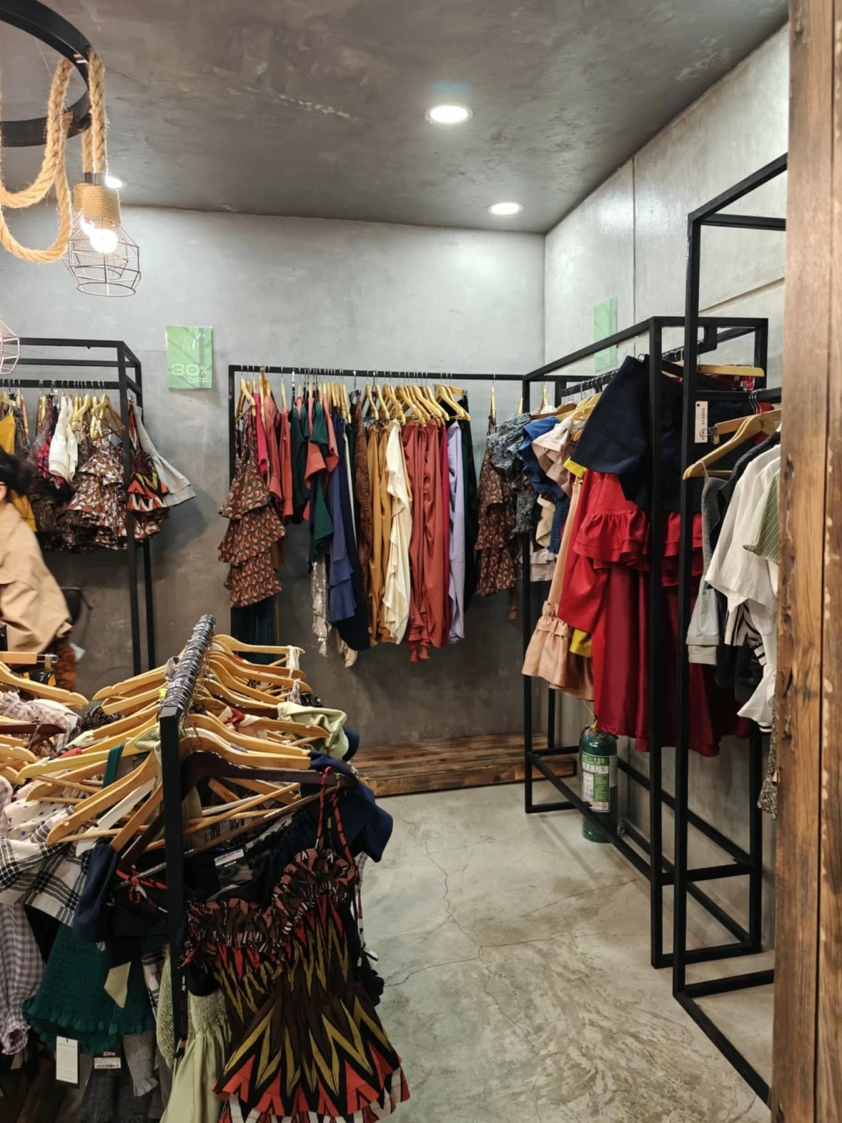 Racks of Yong's ready-to-wear pieces