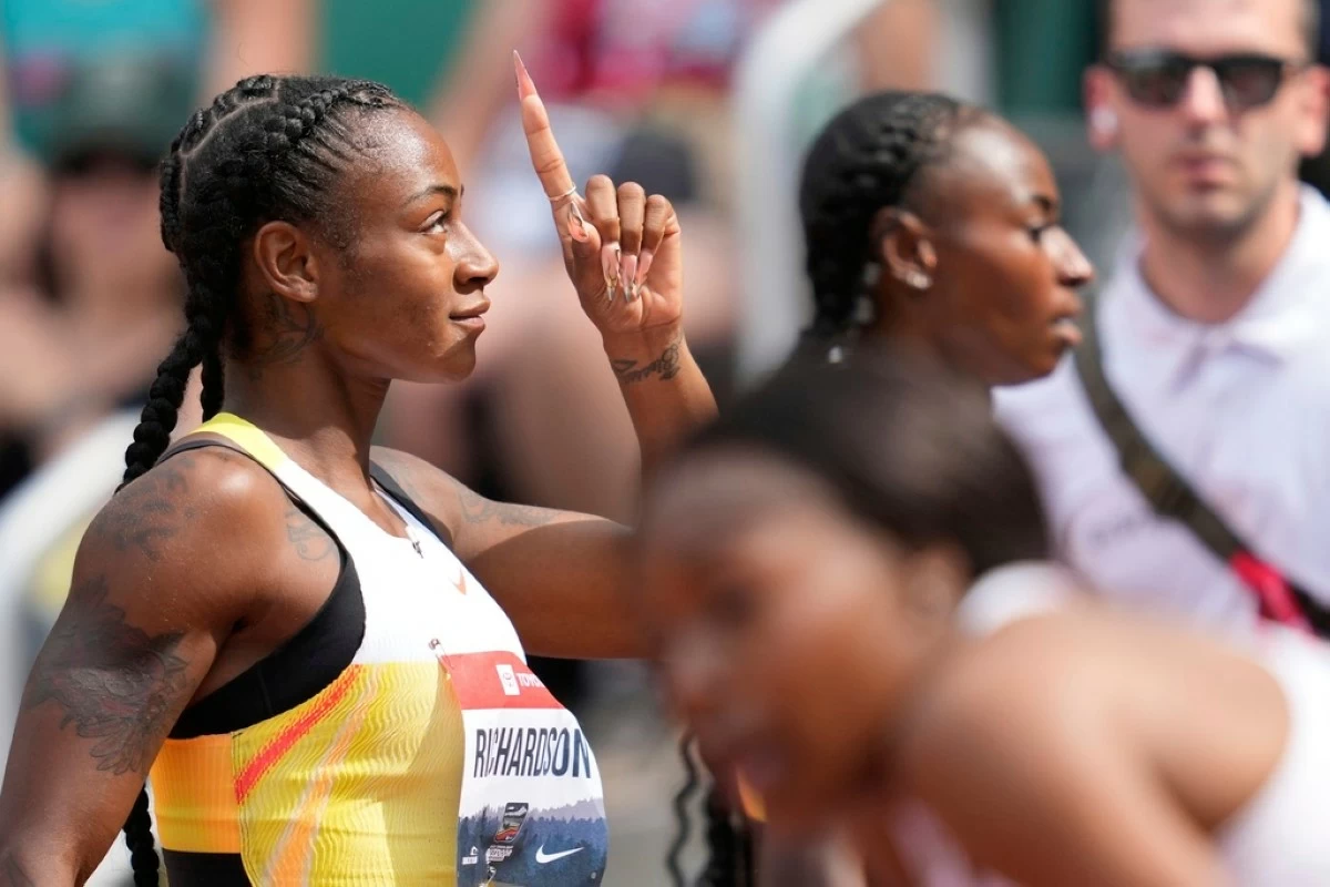 Sha'Carri Richardson reacts after winning her 100m heat during the U.S. Championships athletics meet in Eugene, Ore.,Thursday, July 31, 2025. (AP Photo/Ashley Landis)