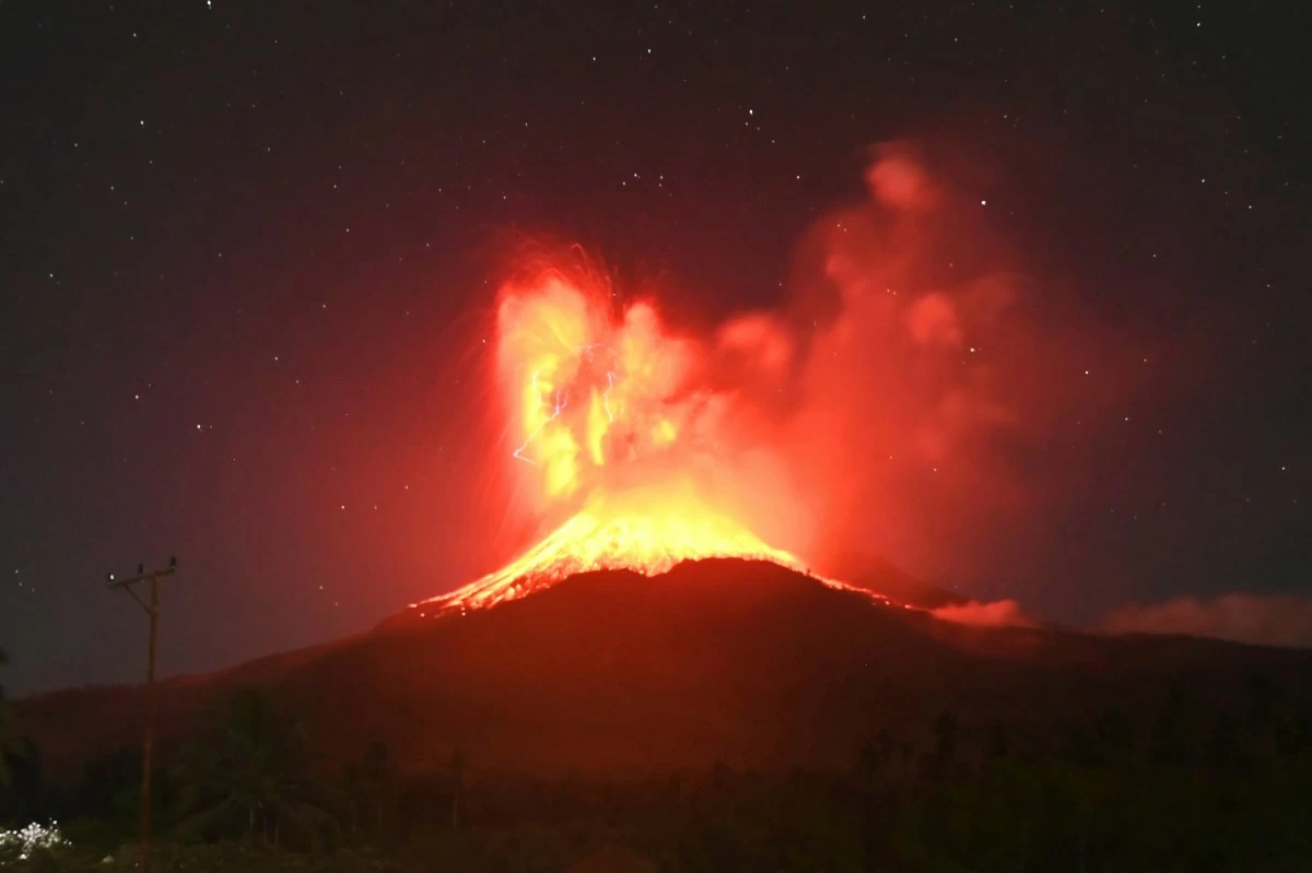 LAVA glows on the slope of Mount Lewotobi Laki-Laki during an eruption in East Flores, Indonesia, Friday, Aug. 1, 2025. (Badan Geologi via AP)