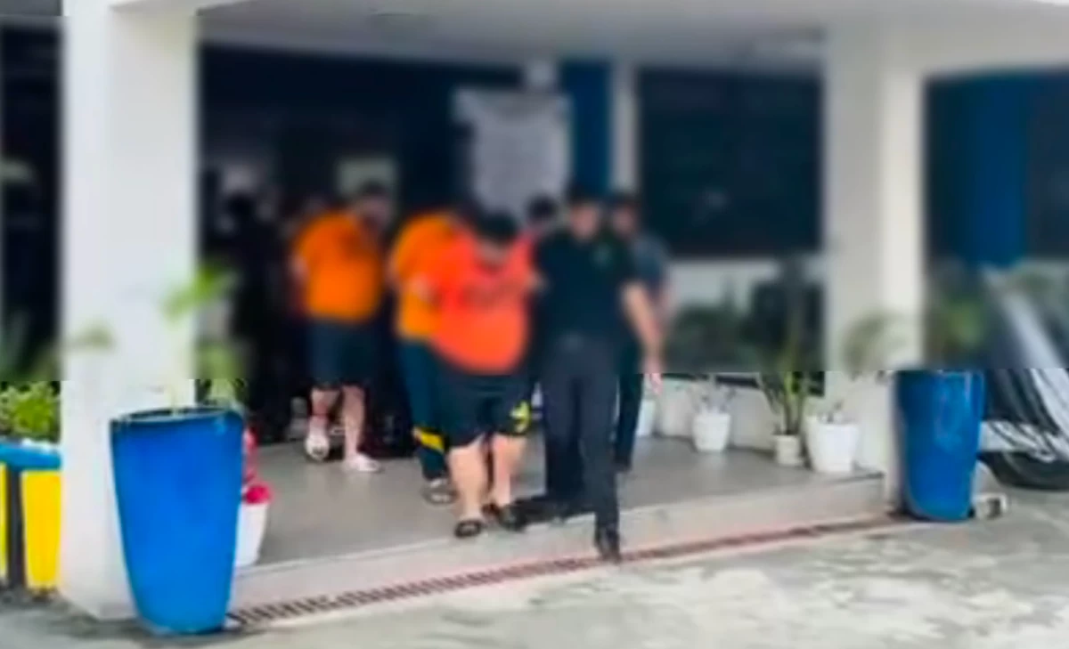 PNP-AKG operatives lead four Chinese kidnap-for-ransom suspects to their detention at Camp Crame in Quezon City following their arrest for abducting a female Chinese. (photo: PNP) 